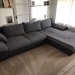 This is a photo of a grey L shape sofa that has been professionally steam cleaned, also the beige carpets have been steam cleaned too carried out by Blackheath Carpet Cleaning.